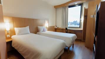 Blackout drapes, soundproofing, iron/ironing board