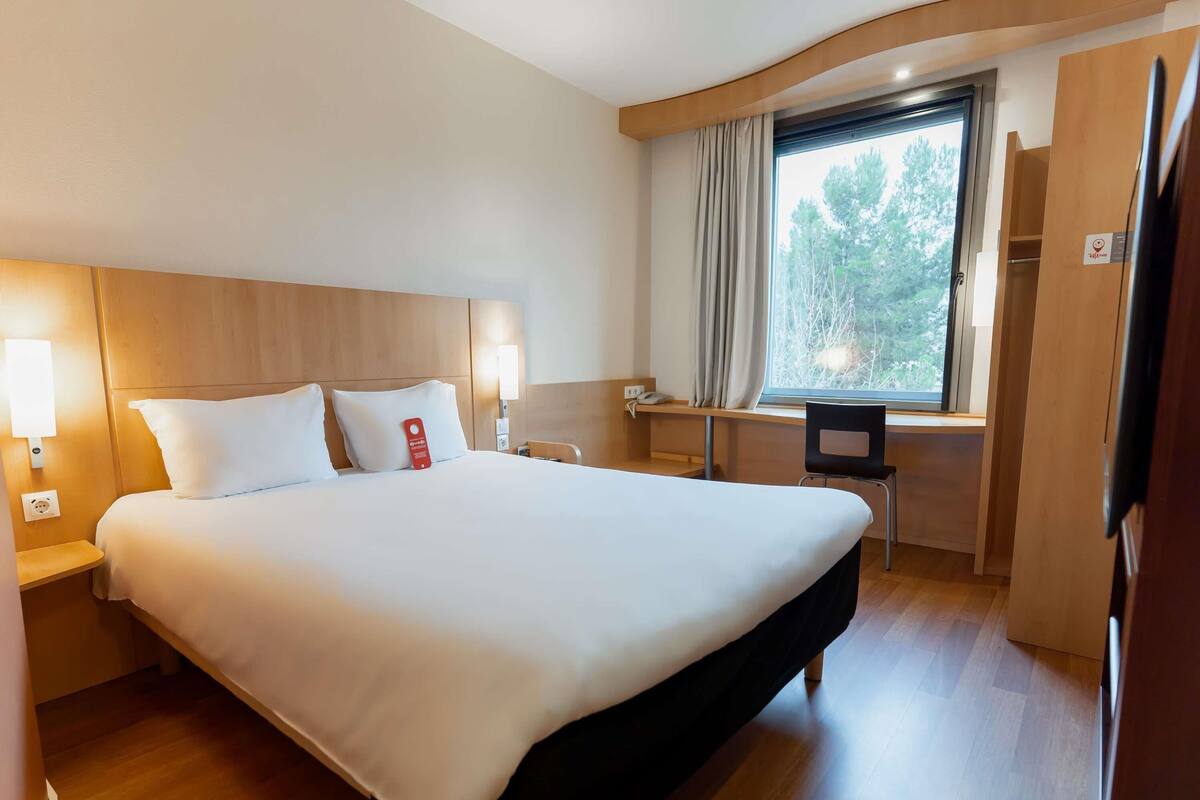 Blackout curtains, soundproofing, iron/ironing board (on request)