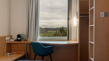 Blackout curtains, soundproofing, iron/ironing board