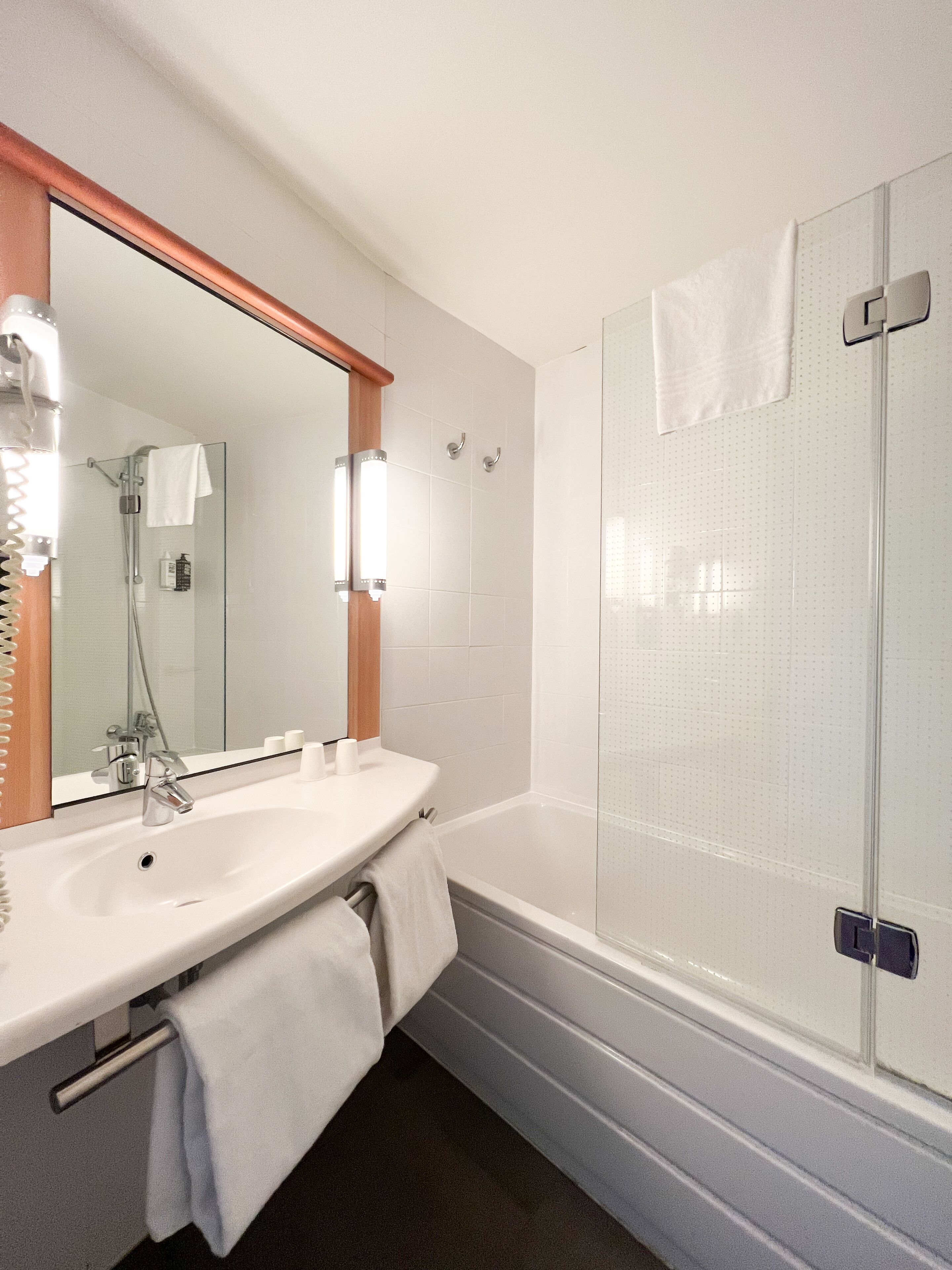 shower, eco-friendly toiletries, hair dryer, towels