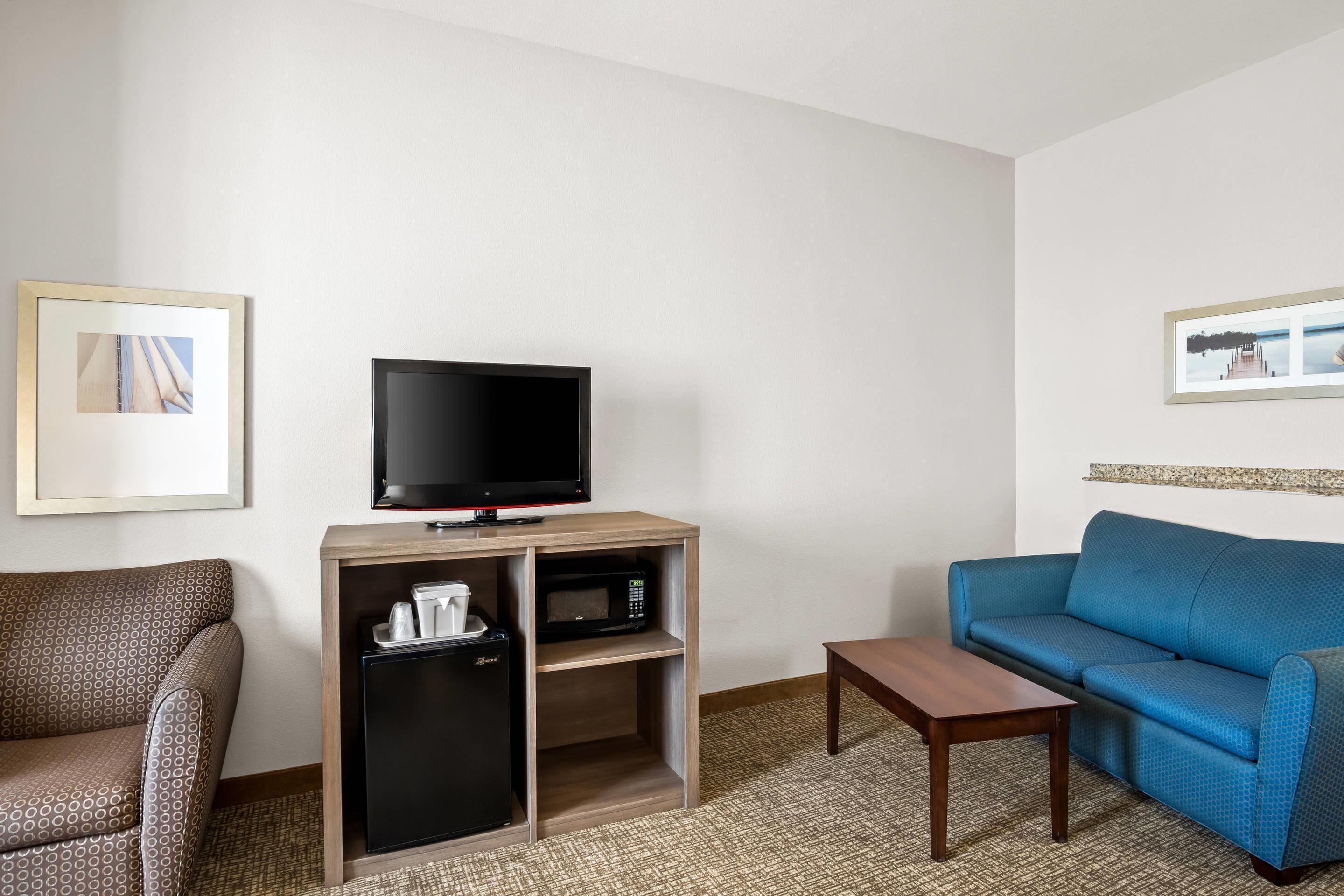 suite, 1 king bed with sofa bed, non smoking | premium bedding, desk, laptop workspace, blackout curtains