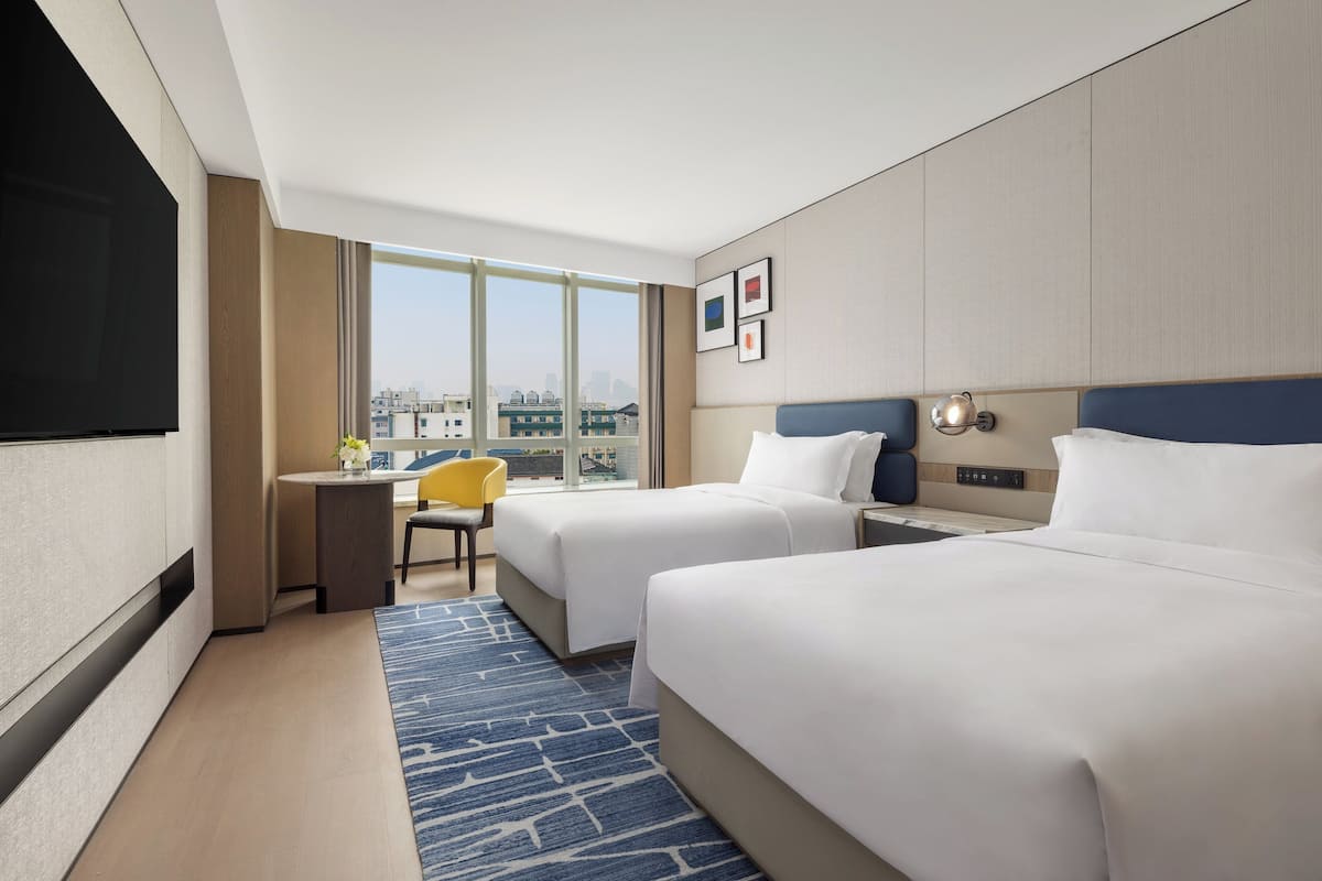 Free minibar items, in-room safe, individually decorated, desk