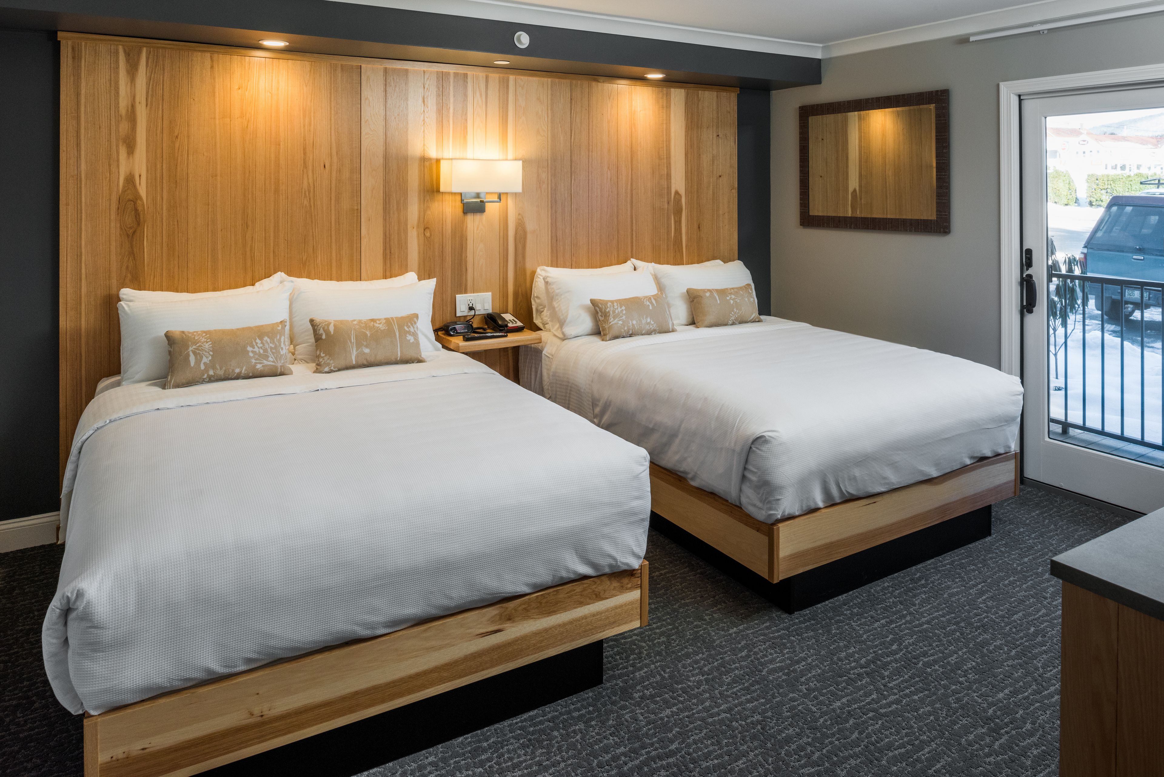 lodge double queen | premium bedding, individually decorated, blackout curtains