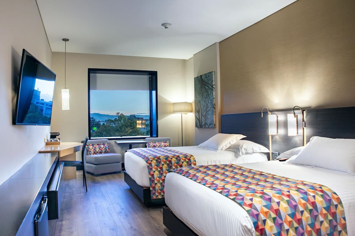 Premium bedding, pillow-top beds, minibar, in-room safe
