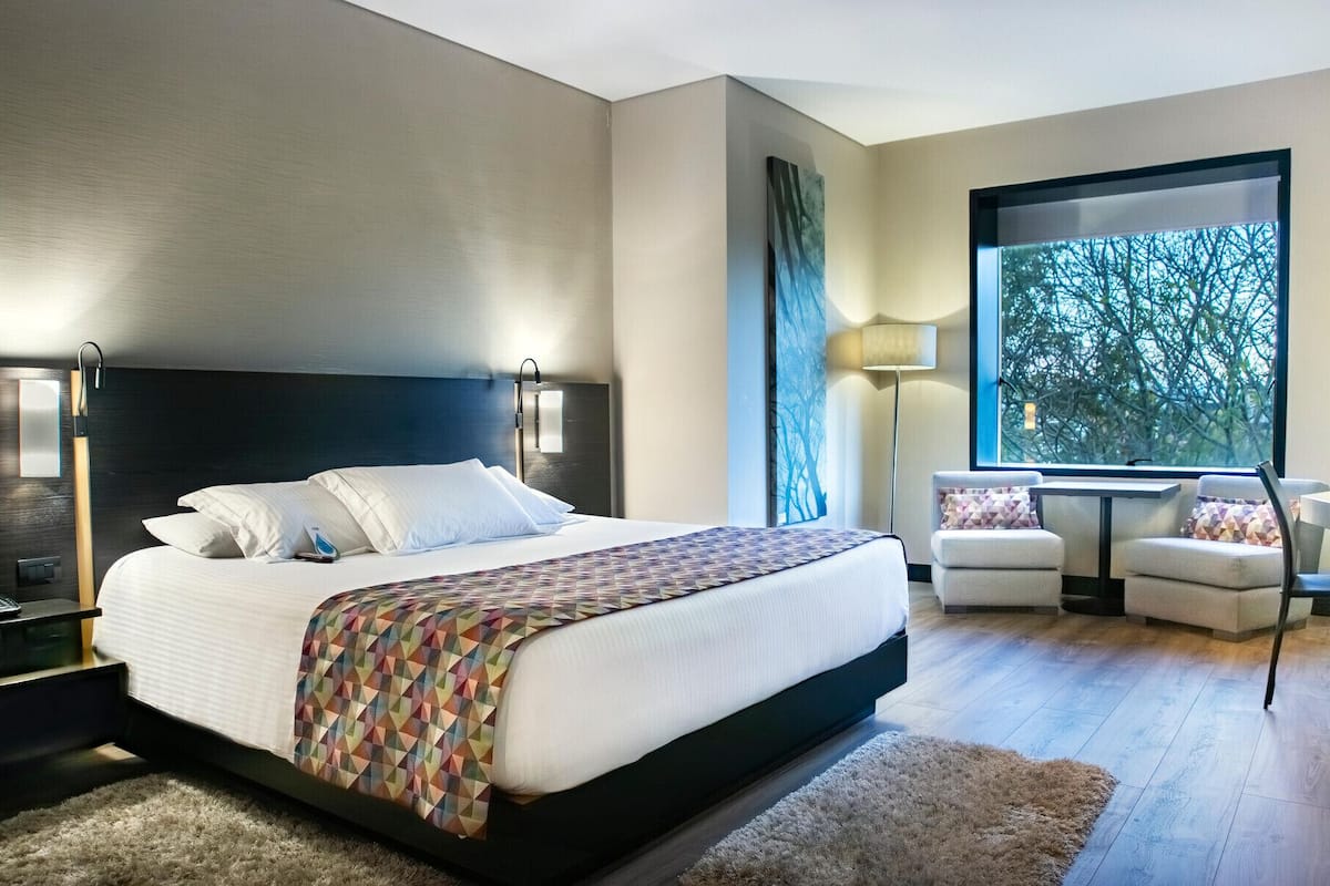 Premium bedding, pillow-top beds, minibar, in-room safe