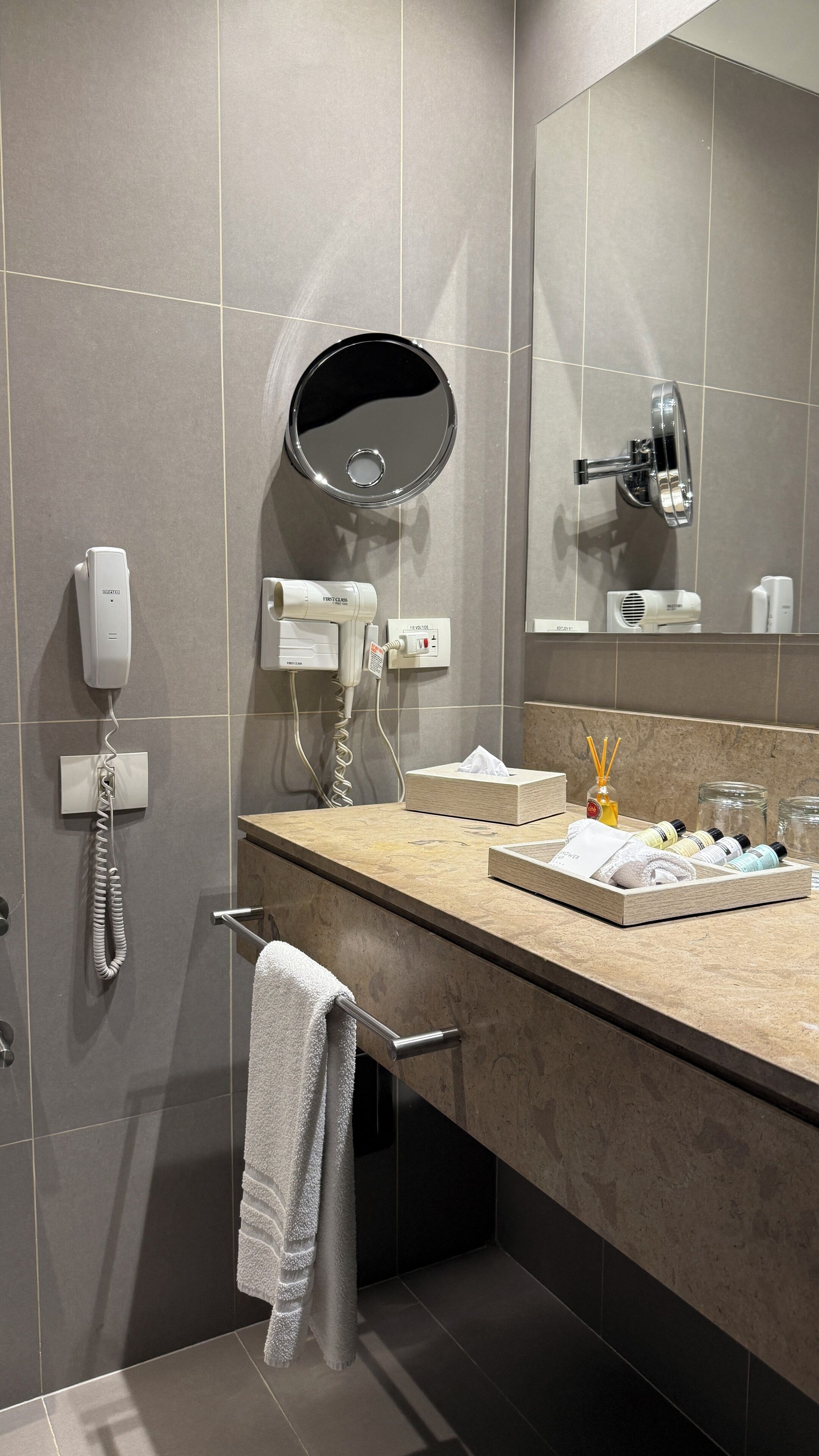 eco-friendly toiletries, hair dryer, bathrobes, slippers