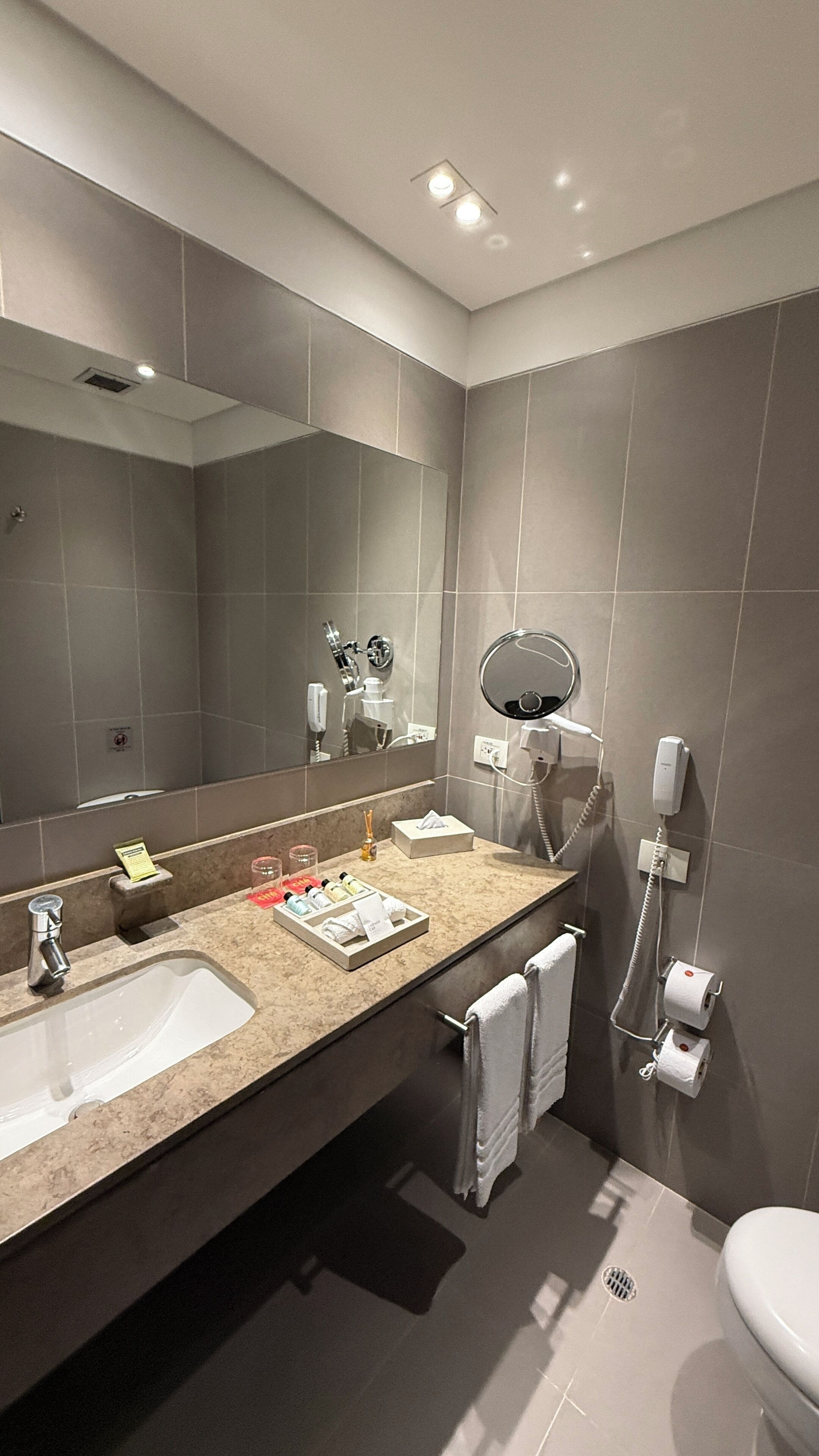 eco-friendly toiletries, hair dryer, bathrobes, slippers