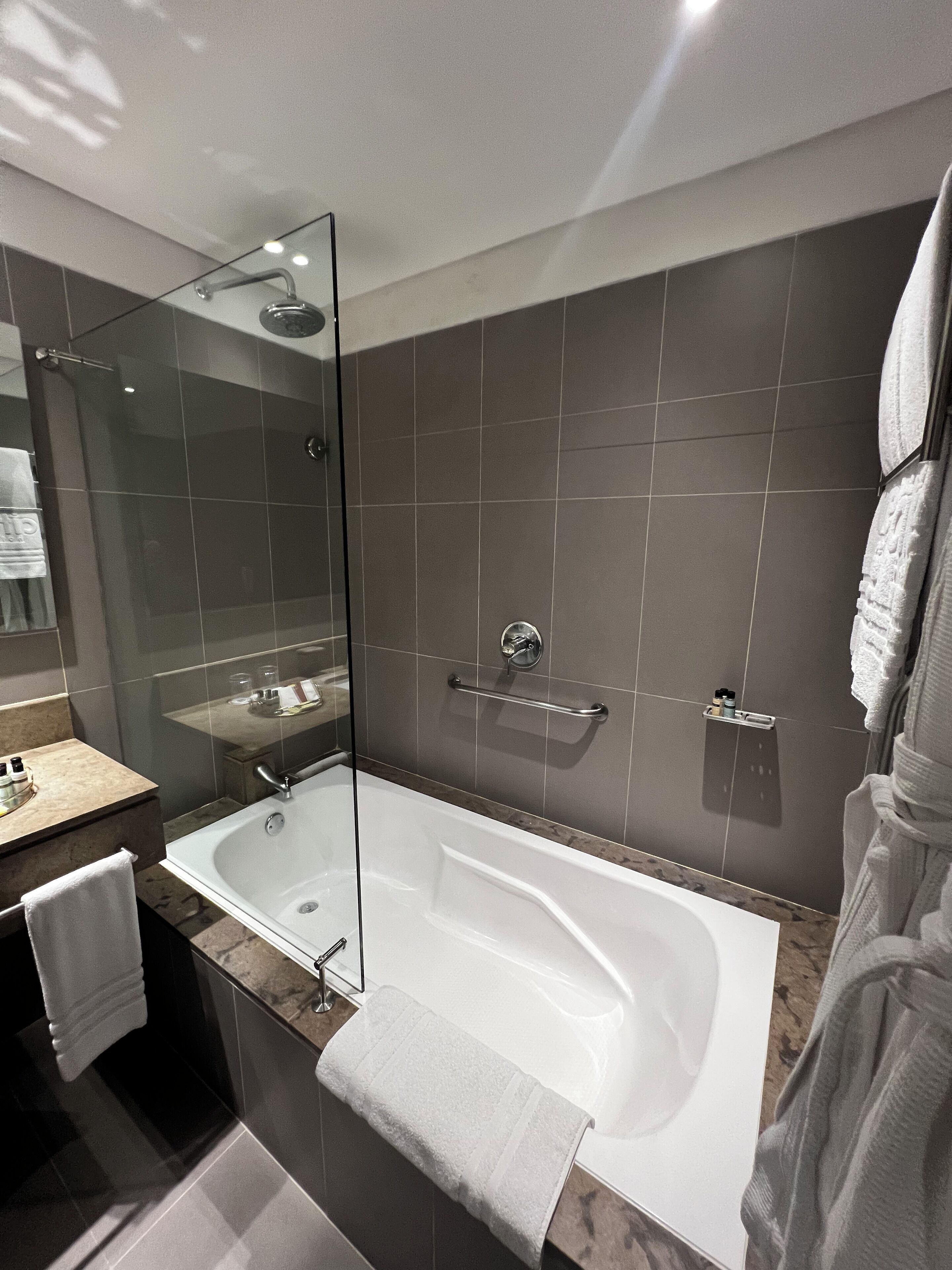 superior room, 1 king bed | bathroom | eco-friendly toiletries, hair dryer, bathrobes, slippers