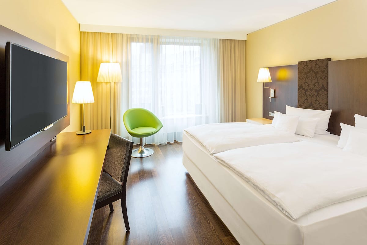 Premium bedding, pillow-top beds, minibar, in-room safe