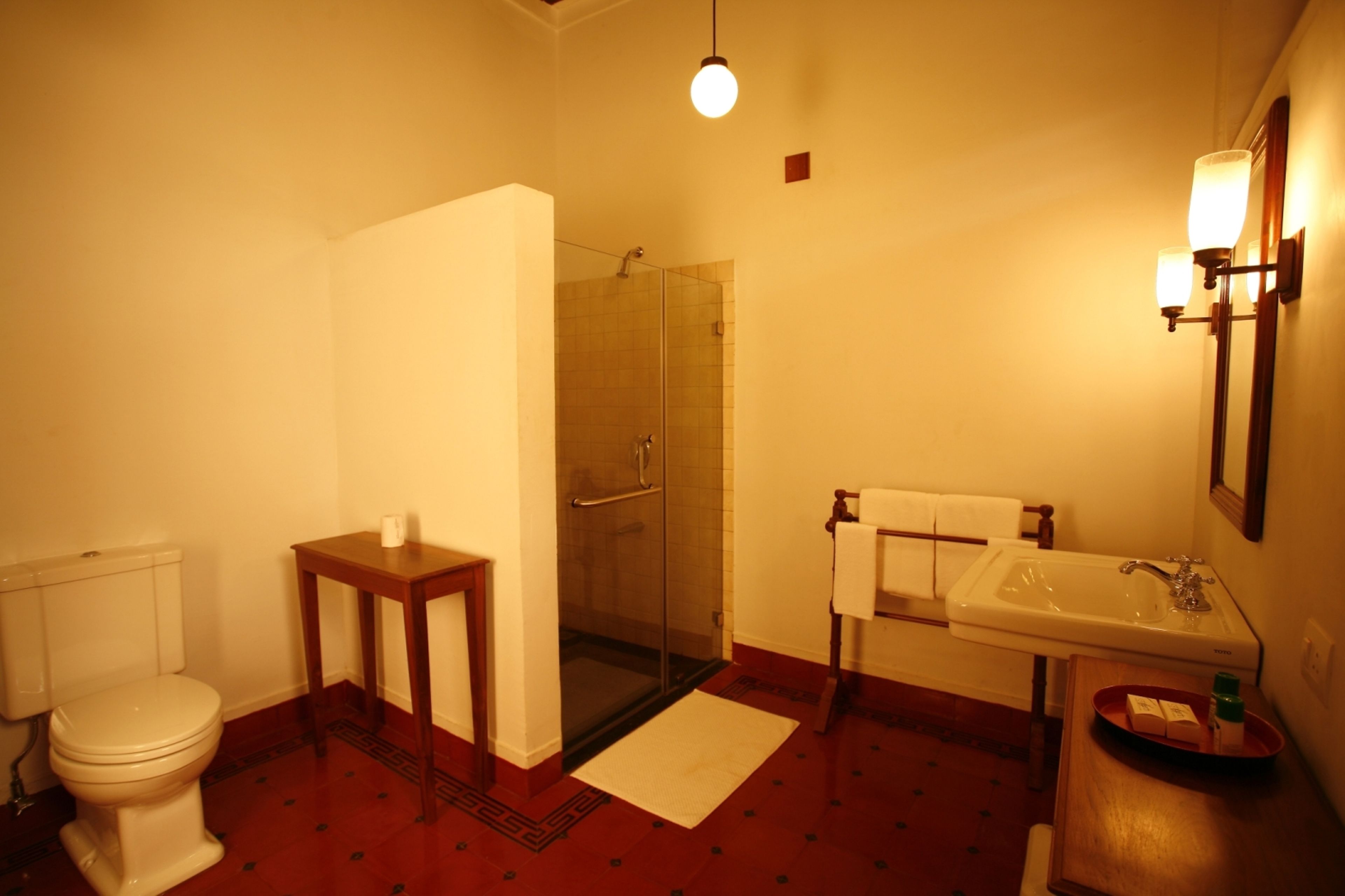 chettinad suite | bathroom | combined shower/bathtub, free toiletries, hair dryer, bathrobes