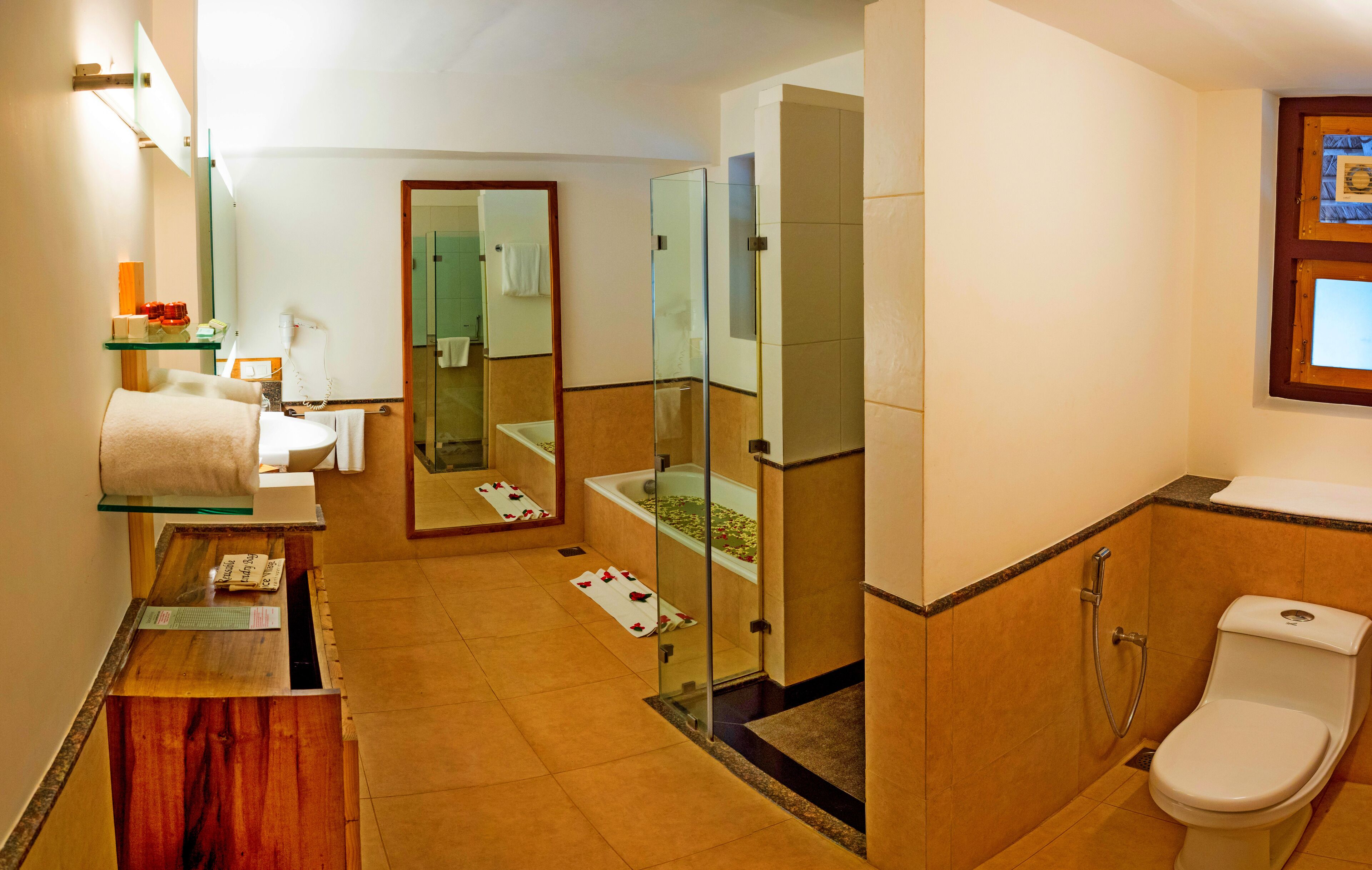 deluxe cottage with private garden | bathroom | shower, free toiletries, hair dryer, bathrobes