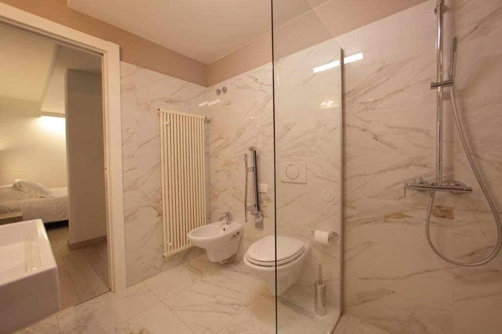 double or twin room, balcony, partial lake view | bathroom | shower, hair dryer, slippers, bidet