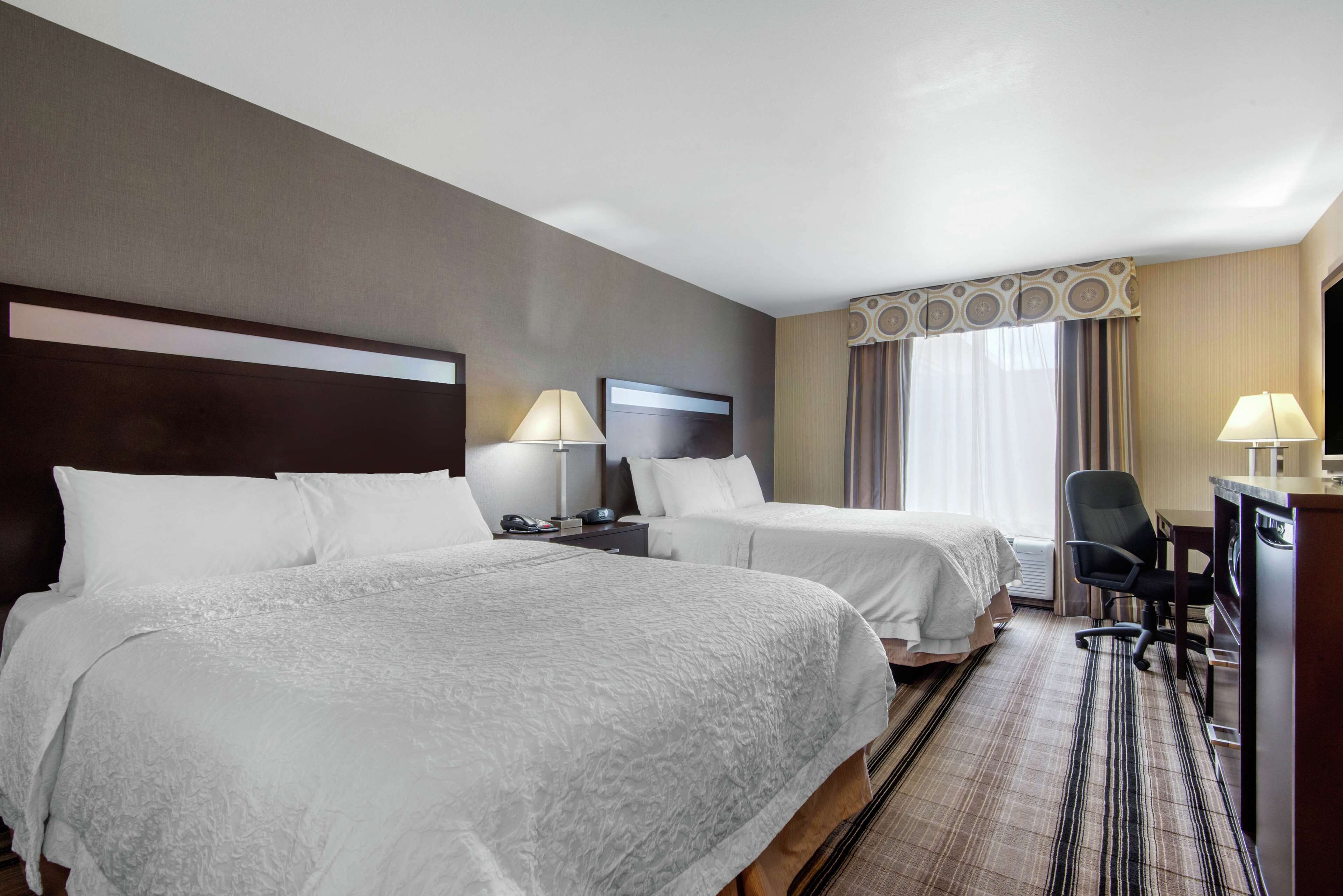 two queen beds | in-room safe, iron/ironing board, free wifi, bed sheets