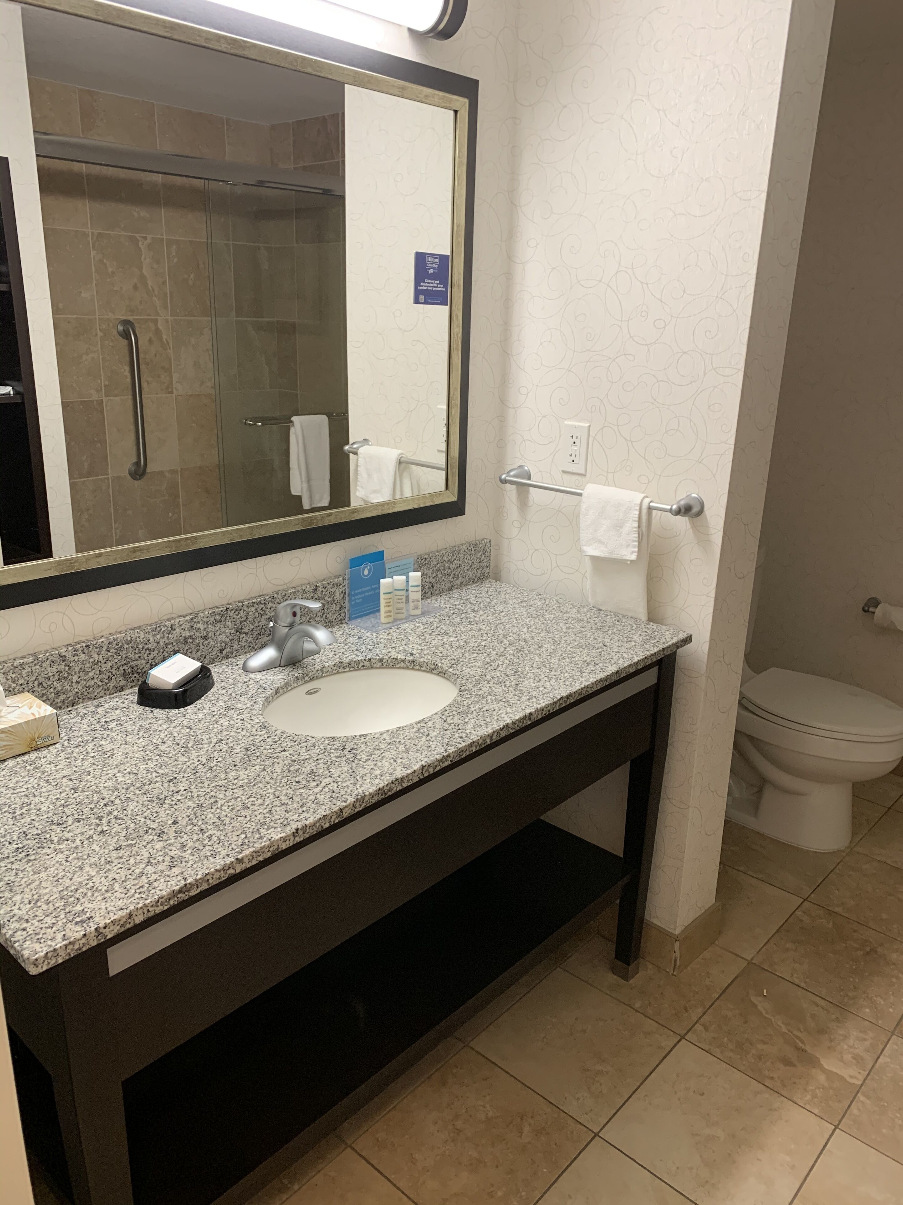 combined shower/bathtub, free toiletries, hair dryer, towels