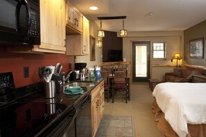 North Wood Suite- Waterpark Access Additional | Private kitchen | Full-sized fridge, microwave, oven, stovetop - Hope Lake Lodge & Indoor Waterpark (Cortland)