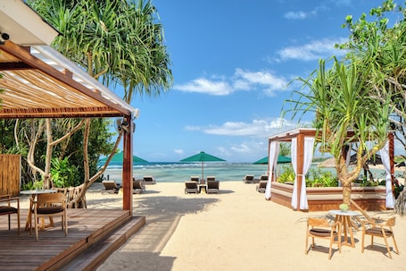 Private beach nearby, white sand, free beach shuttle, sun-loungers. Amarterra Villas Resort Bali Nusa Dua, Autograph Collection
