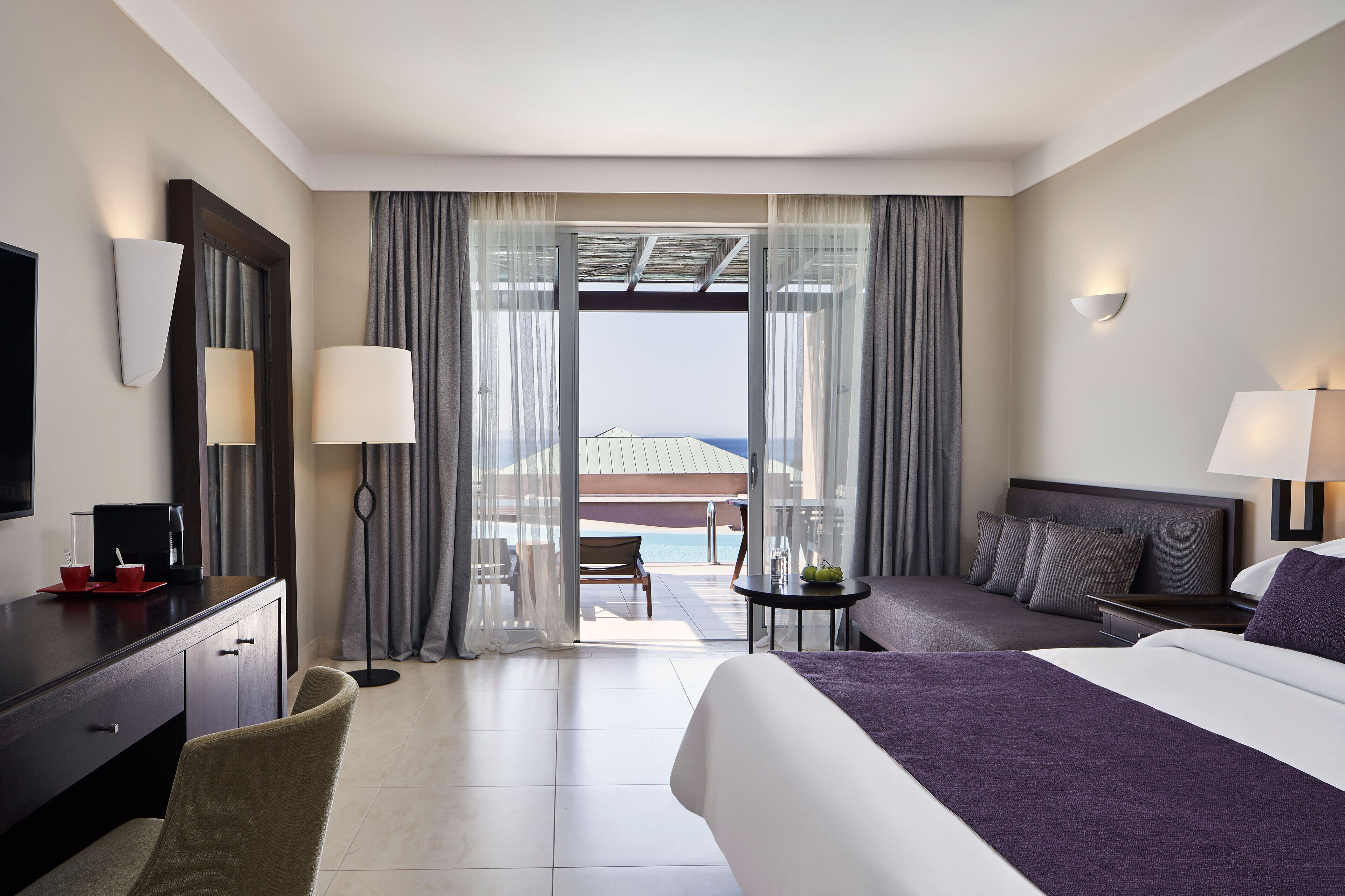 Premium bedding, free minibar items, in-room safe, desk