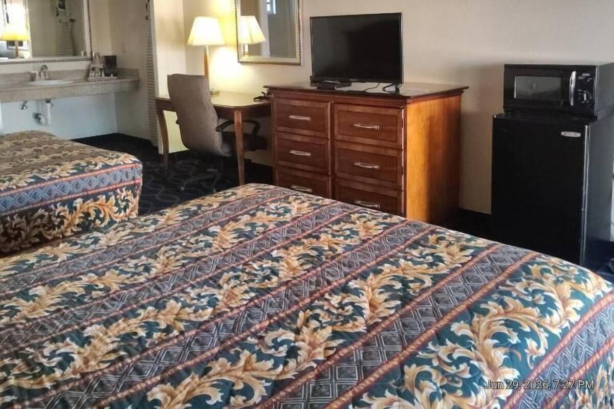 Room, 2 Queen Beds | Desk, laptop workspace, blackout drapes, iron/ironing board