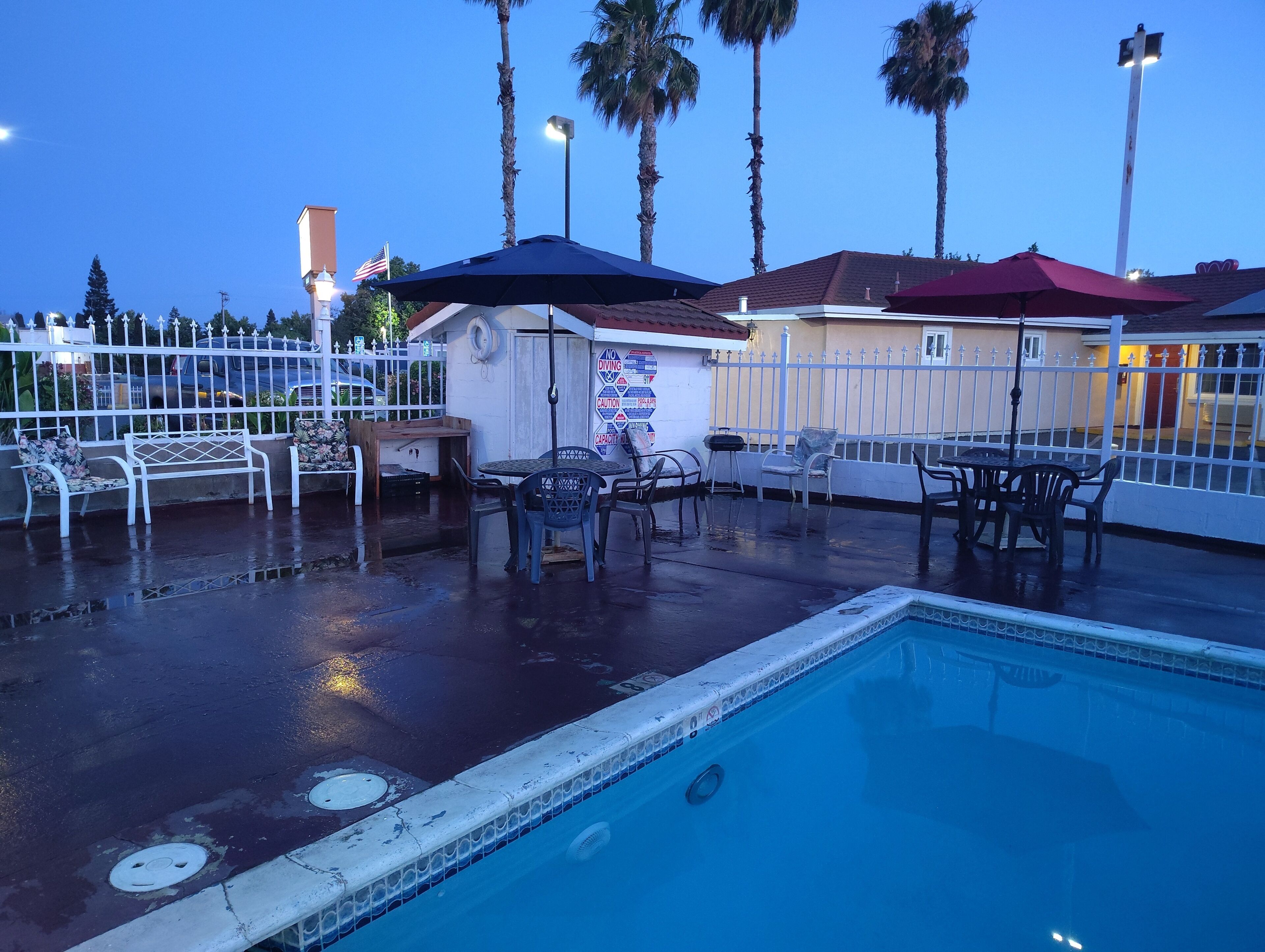 Seasonal outdoor pool, pool loungers