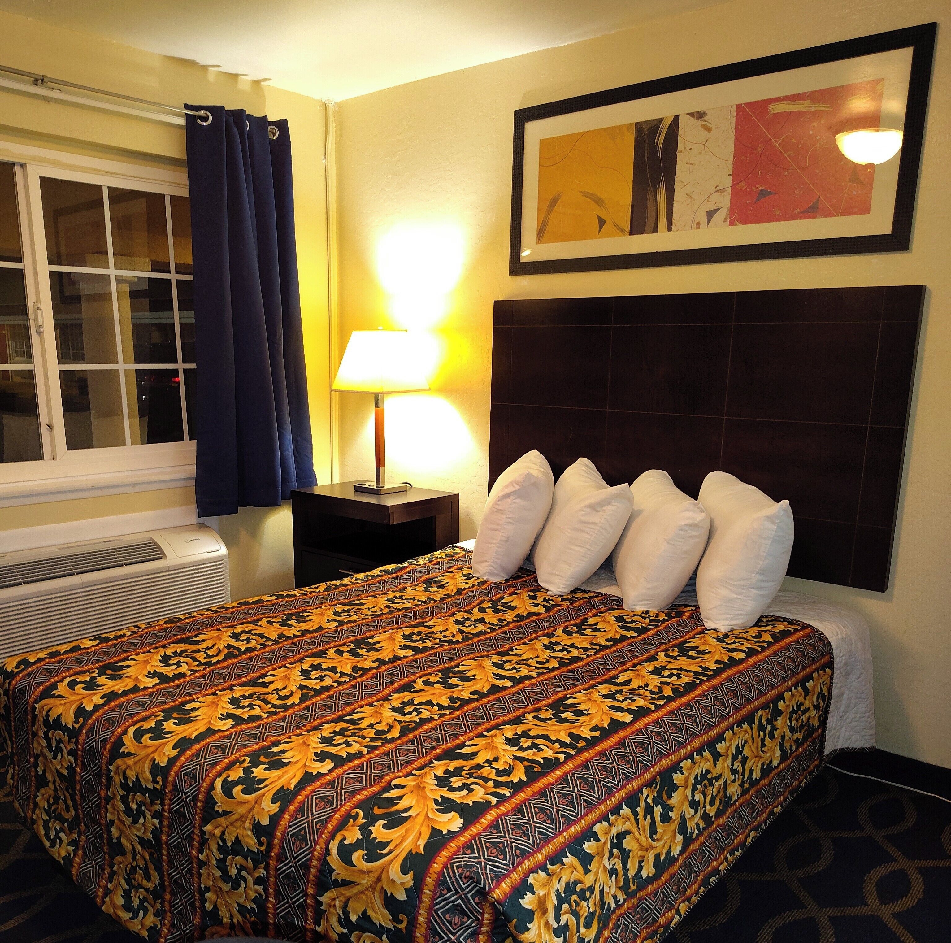 One queen bed non smoking | Desk, laptop workspace, blackout drapes, iron/ironing board