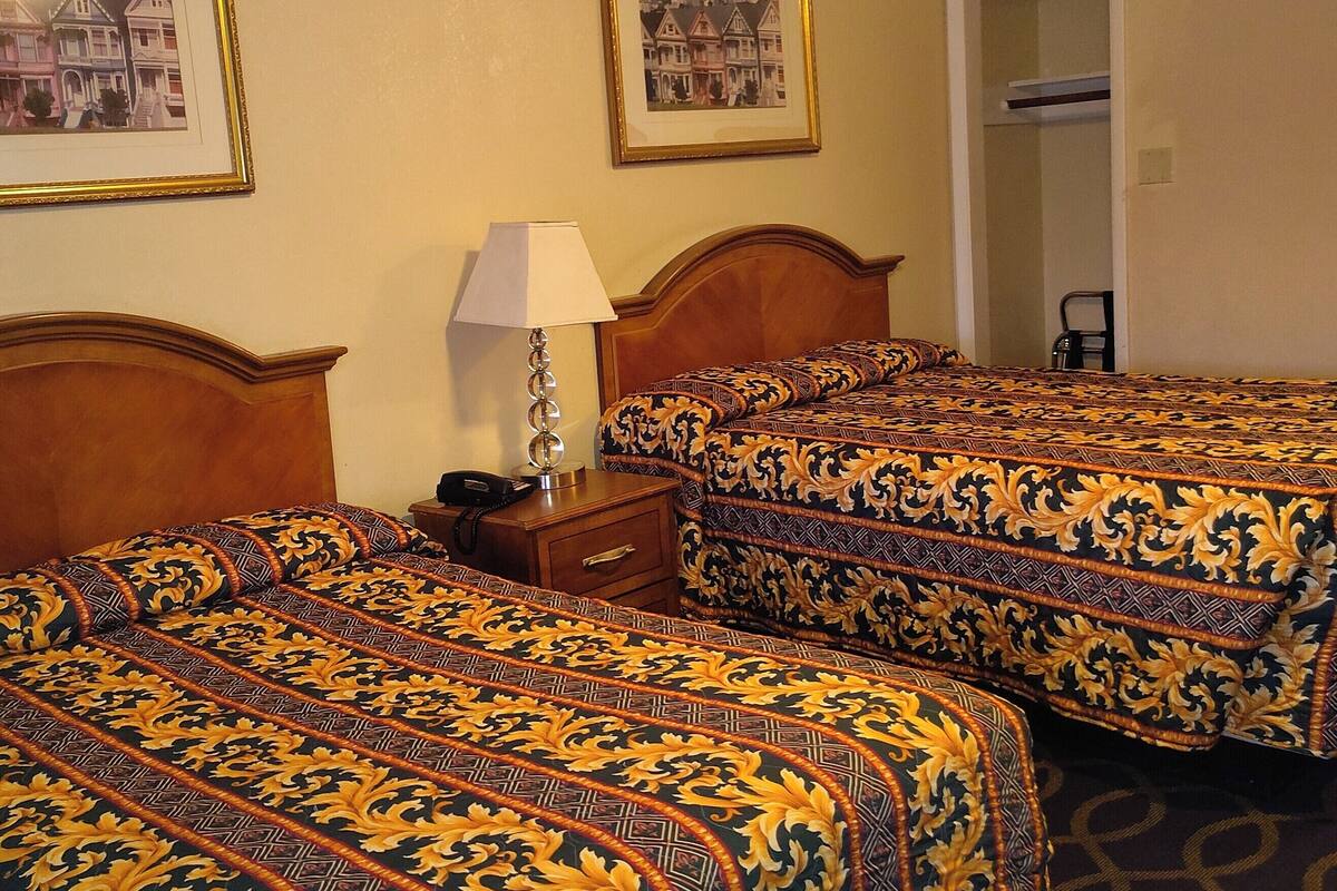 Standard Double Room | Desk, laptop workspace, blackout drapes, iron/ironing board