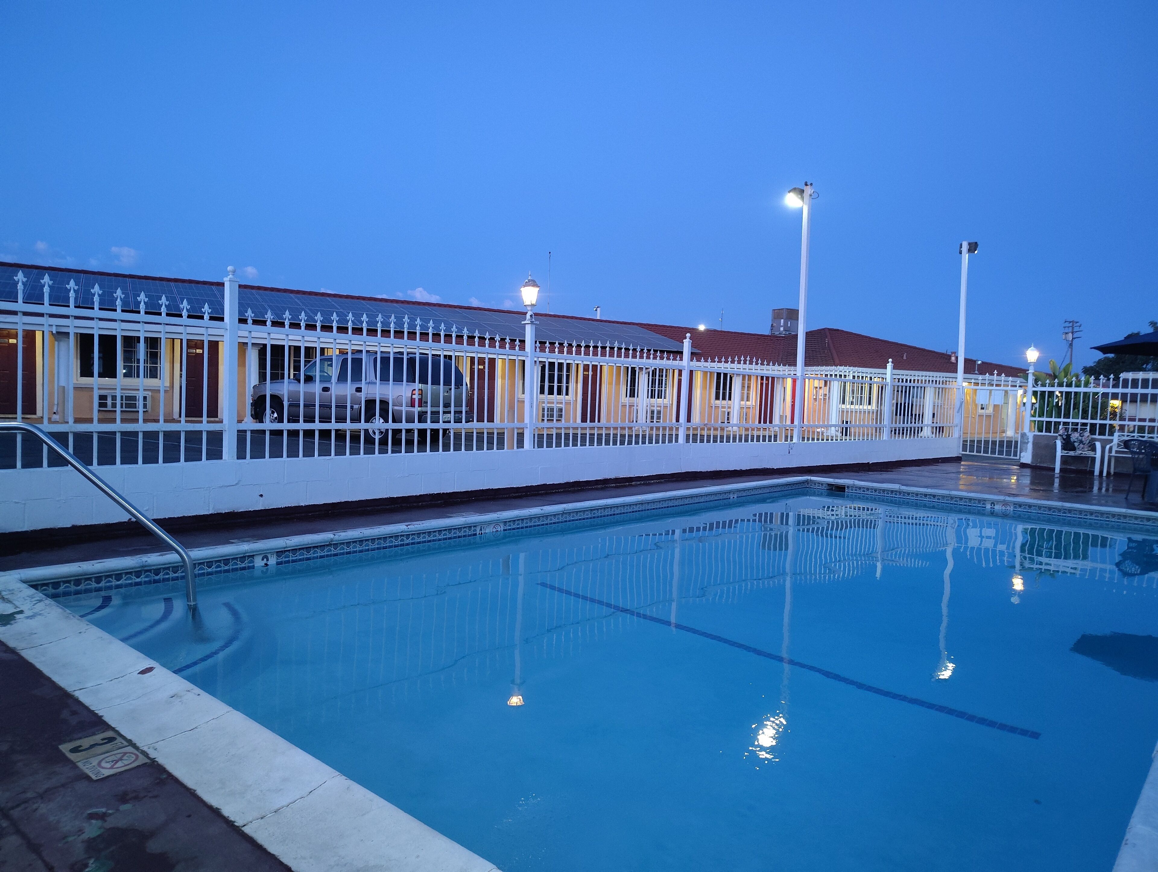 Seasonal outdoor pool, pool loungers