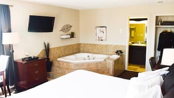 Suite, 1 King Bed, Non Smoking, Jetted Tub | Desk, soundproofing, iron/ironing board, free cots/infant beds