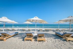 On the beach, sun loungers, beach umbrellas, beach towels - Gaia Royal Hotel (Kos)