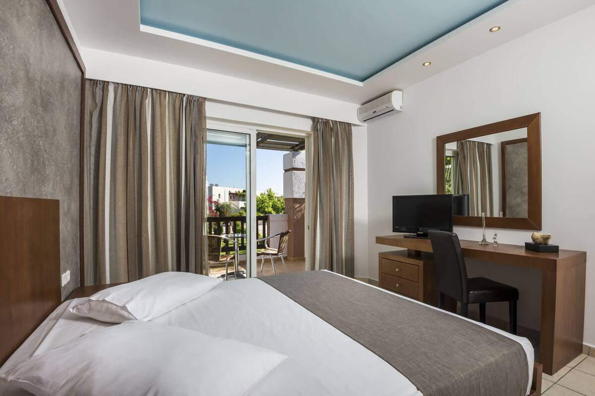Family Room, Partial Sea View | Premium bedding, in-room safe, desk, iron/ironing board (on request)