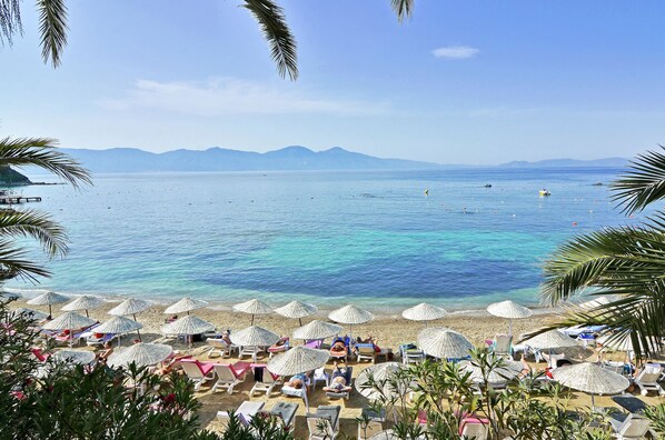 Private beach, free beach cabanas, sun loungers, beach umbrellas