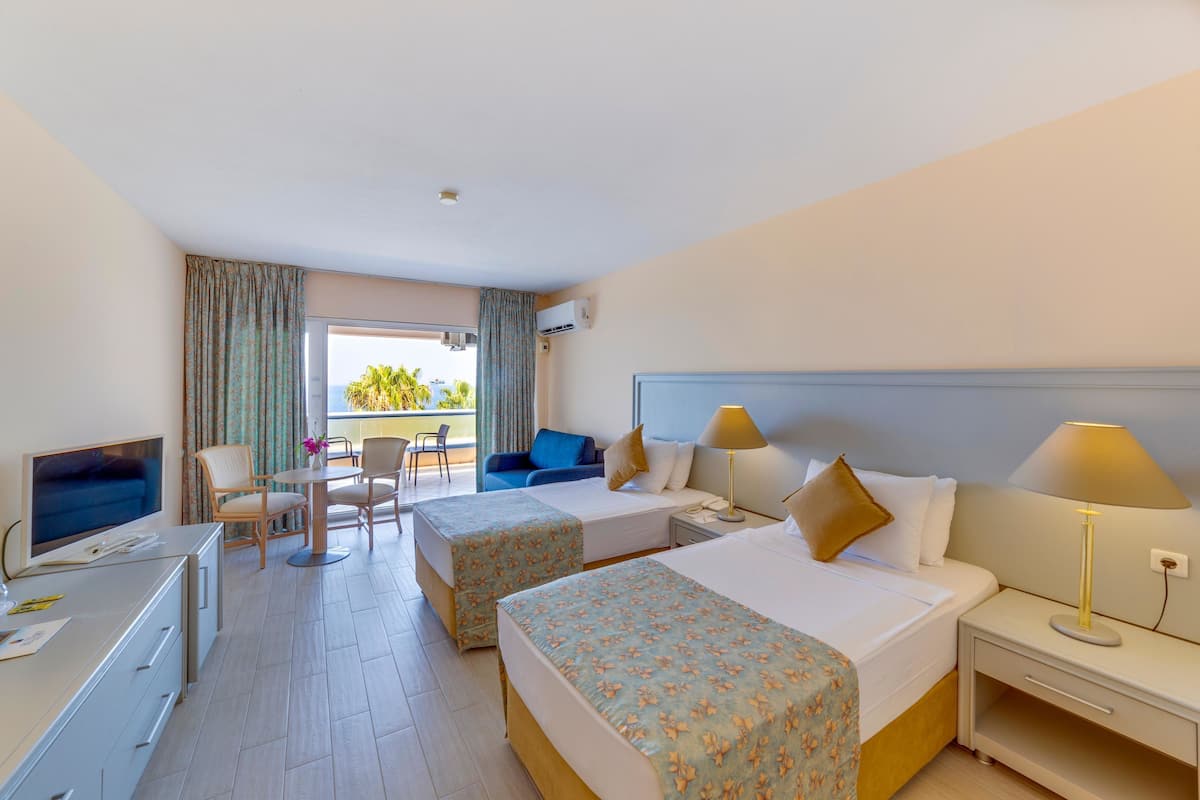 Standard Double or Twin Room, Garden View, Ground Floor | Free minibar, in-room safe, desk, free cots/infant beds