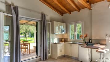 Apartment, 2 Bedrooms | Minibar, desk, soundproofing, iron/ironing board