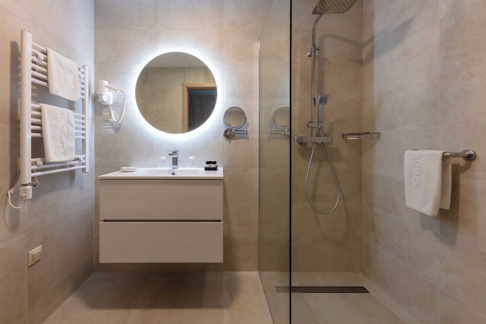 deluxe double or twin room | bathroom | hair dryer, bathrobes, towels