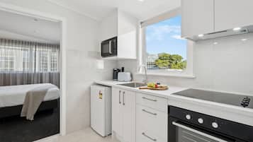 Luxury Room, 1 Bedroom | Private kitchen | Fridge, coffee/tea maker