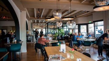 Breakfast, lunch, dinner served; alfresco dining