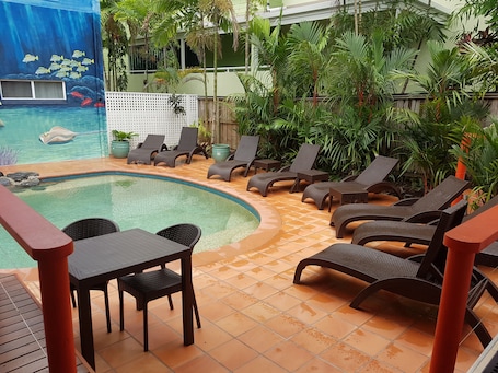 Outdoor pool, pool umbrellas, sun loungers