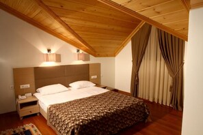 Familierom | Sengetøy av topp kvalitet, minibar, safe på rommet og lydisolert