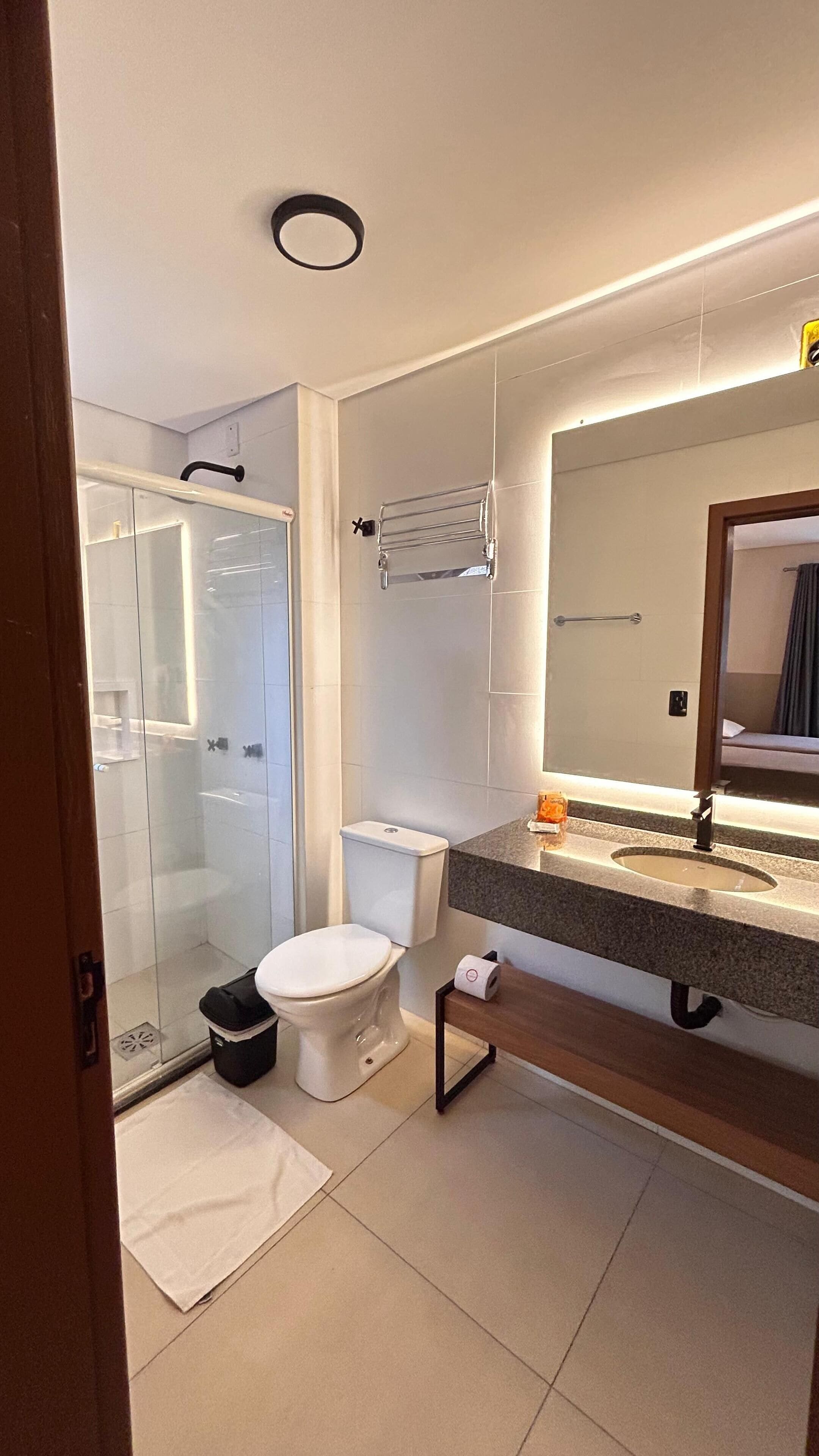superior room, ensuite, garden view | bathroom | towels, soap, shampoo, toilet paper