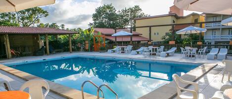 Indoor pool, outdoor pool, open 10:00 AM to 9:00 PM, pool umbrellas