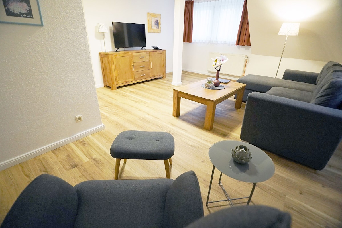 triple room | living area | tv