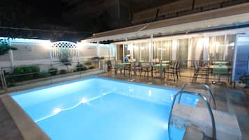 Outdoor pool, pool umbrellas, sun loungers