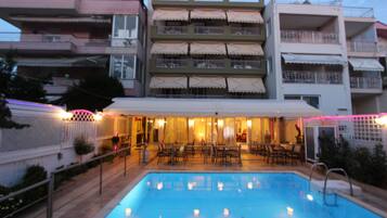 Outdoor pool, pool umbrellas, pool loungers