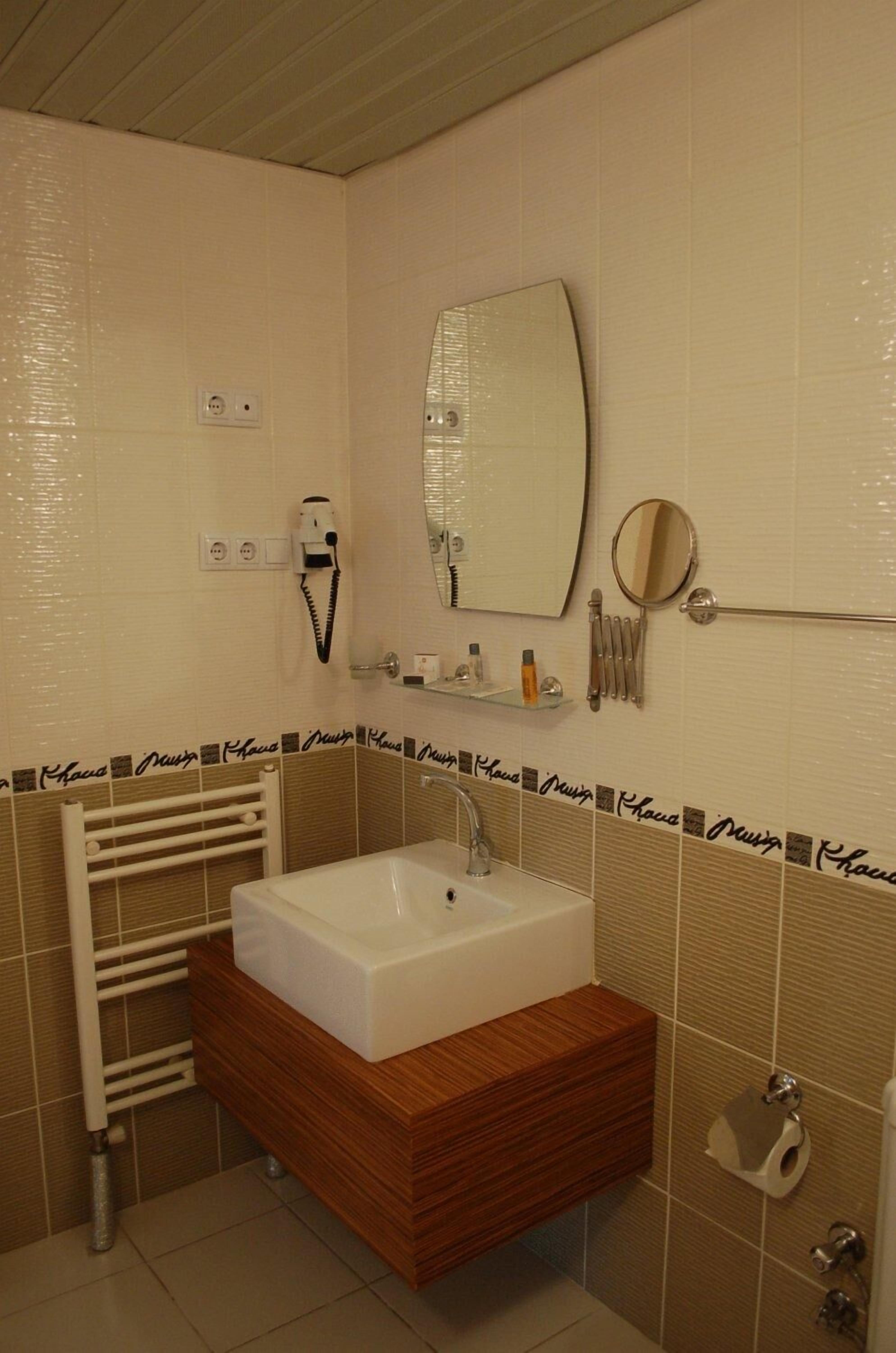 free toiletries, hair dryer, slippers, towels