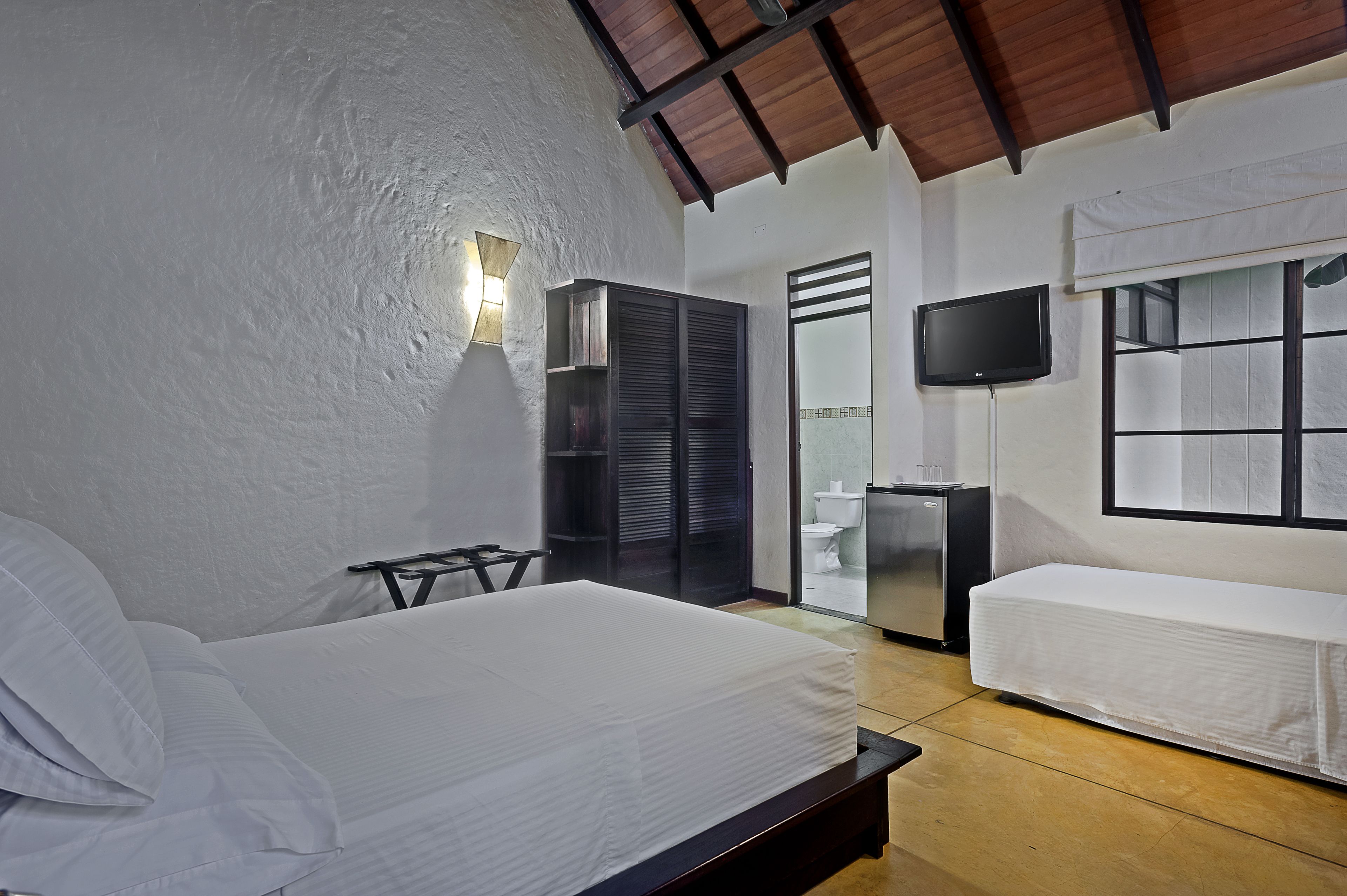 bungalow familiar | 1 bedroom, minibar, in-room safe, iron/ironing board