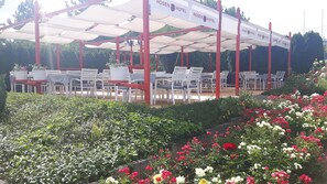 Breakfast, lunch served; international cuisine, al fresco dining 