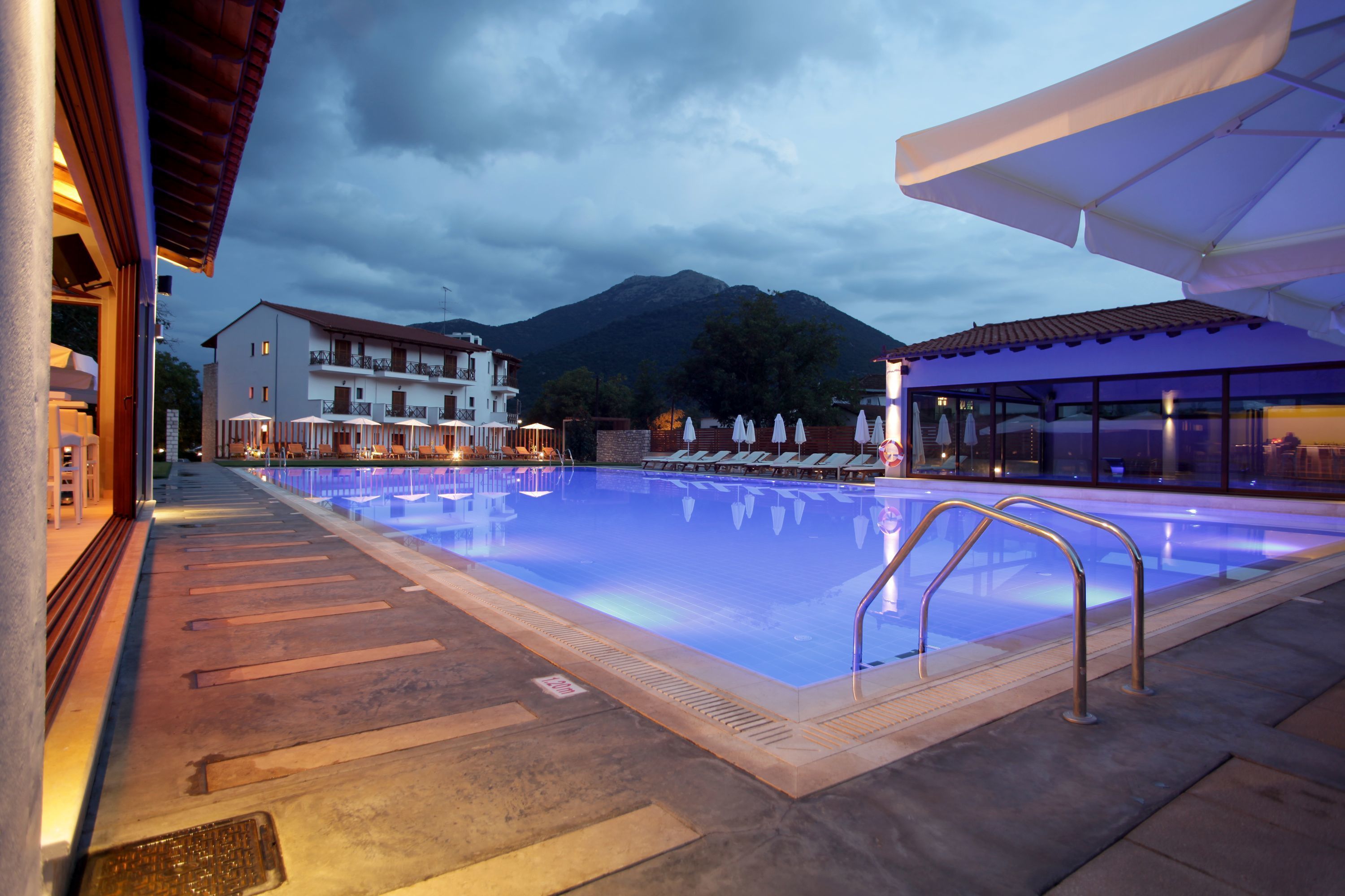 seasonal outdoor pool, pool umbrellas, pool loungers