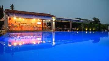 Seasonal outdoor pool, pool umbrellas, pool loungers