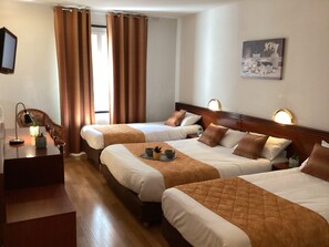 Standard Quadruple Room | 1 bedroom, individually decorated, individually furnished, desk