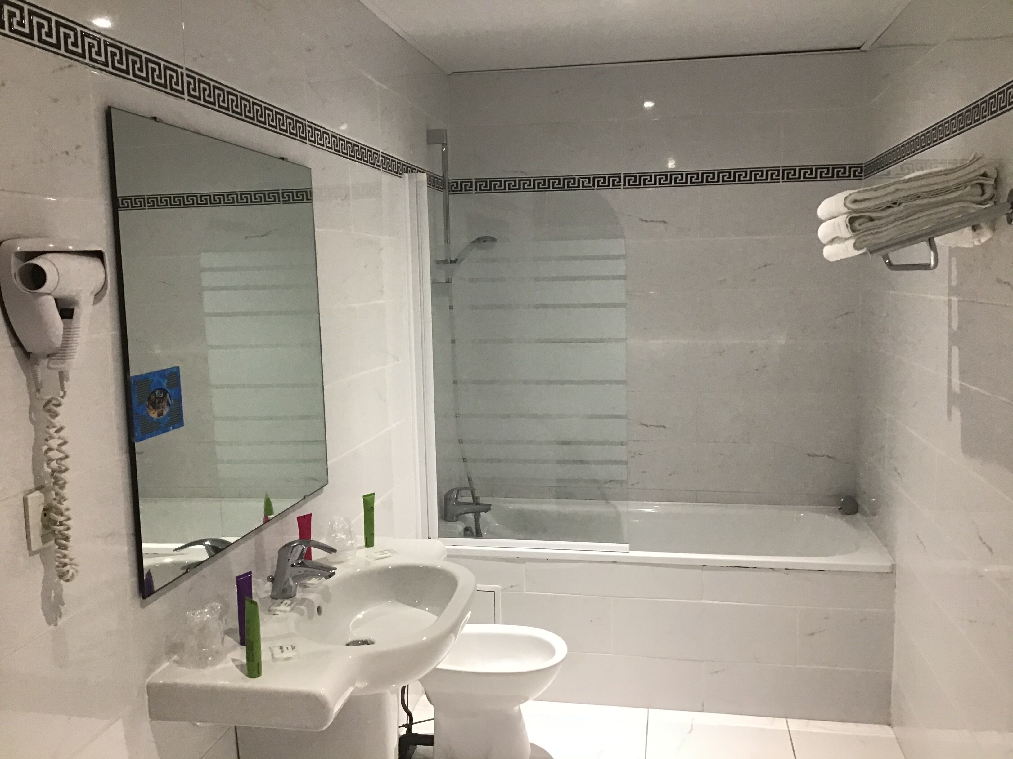 standard quadruple room | bathroom | shower, hair dryer, bidet, towels