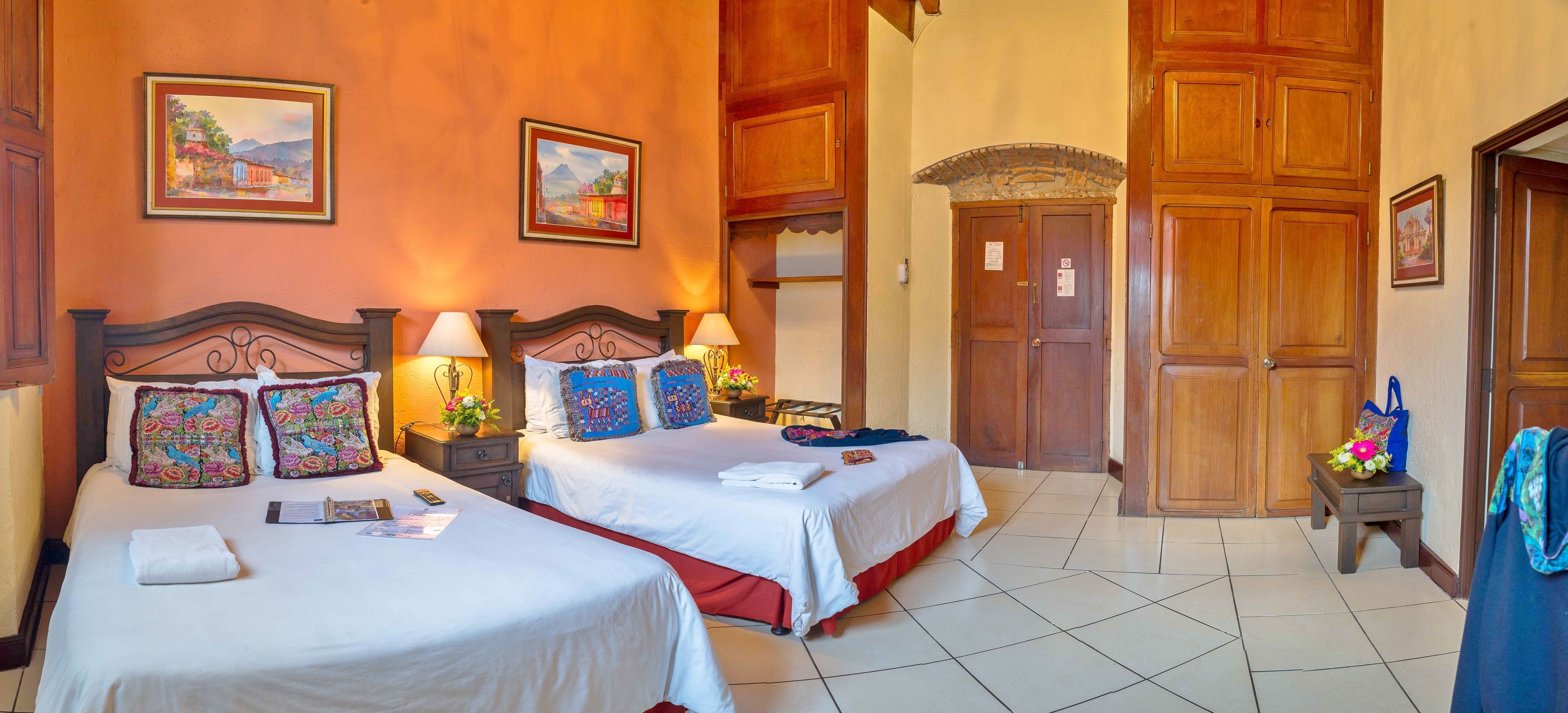 deluxe double room, garden view, courtyard area | premium bedding, tempur-pedic beds, minibar, in-room safe